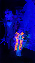Blacklight Responsive Haunted Mansion Graveyard Bow and Skull Set