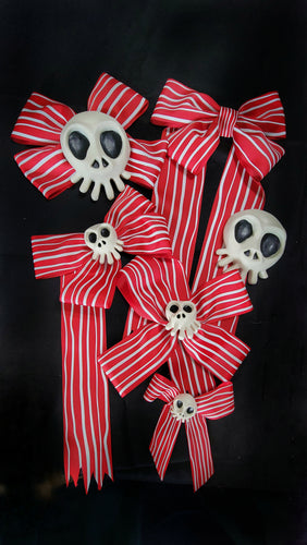 Red squiggly stripe ribbon woth nightmare before Christmas haunted mansion holiday skulls
