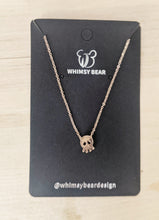 Itty Bitty Skull Necklace and Skull and Bow Earrings